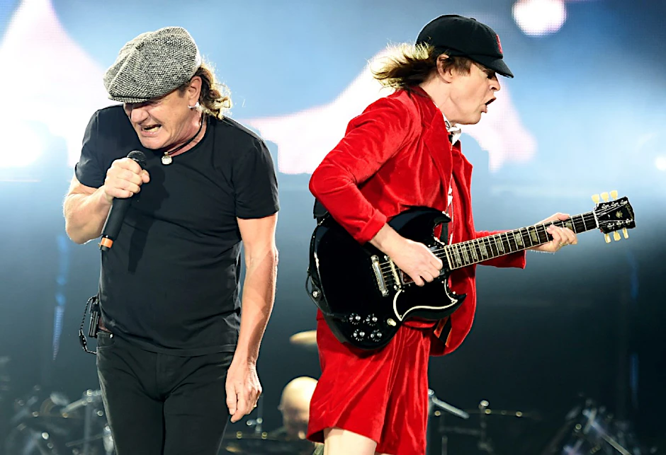 Sie sind die Frontmänner bei AC/DC: Brian Johnson (li.) und Angus Young.