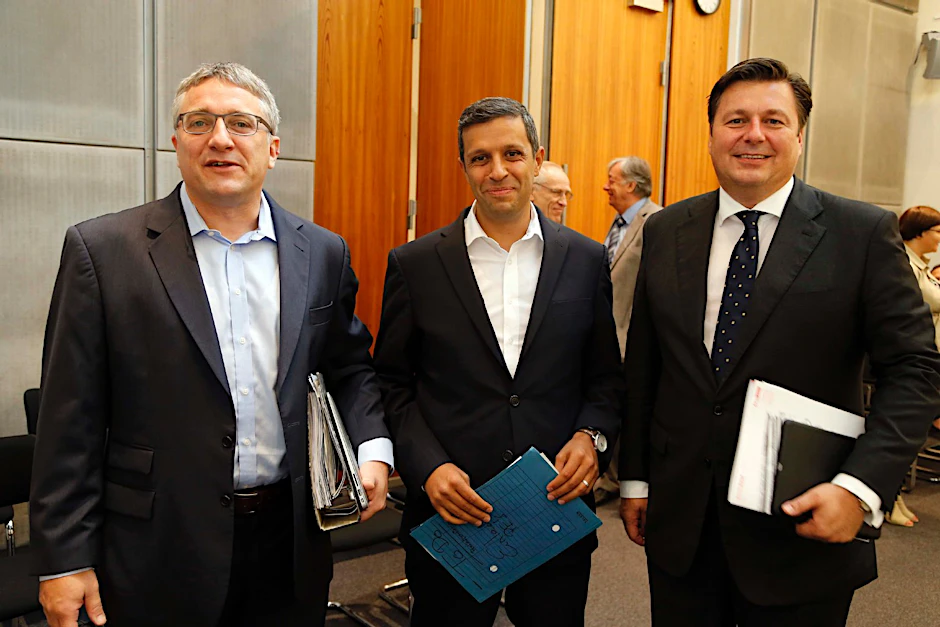 Die SPD ist glücklich: Thorsten Schneider, Raed Saleh, Andreas Geisel bei der Präsentation des Kompromisses.