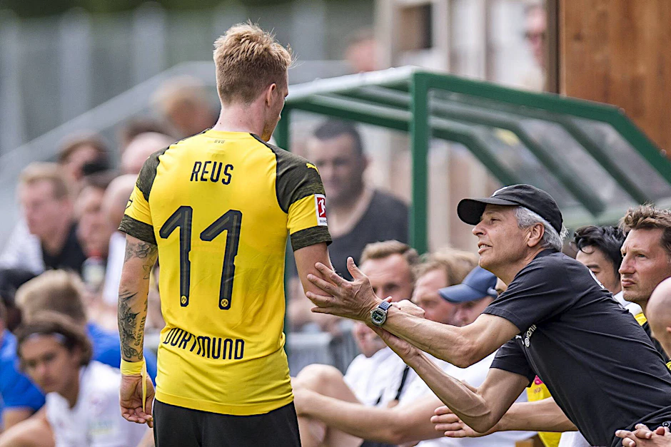 Trainer Lucien Favre (r.) und Kapitän Marco Reus wollen den BVB wieder stark machen.