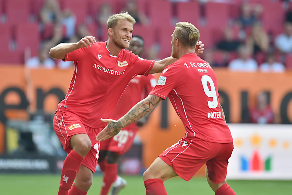 Sebastian Andersson (l.) jubelt am 2. Spieltag über sein und Unions erstes Bundesligator beim 1:1 in Augsburg. 