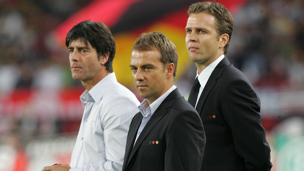 Bundestrainer Joachim Löw, der damalige Co Trainer Hans Dieter Flick und Teammanager Oliver Bierhoff. 