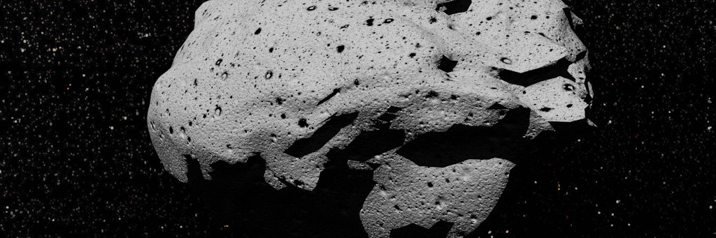 Ein Asteroid fliegt durch den Weltraum (Symbolbild)