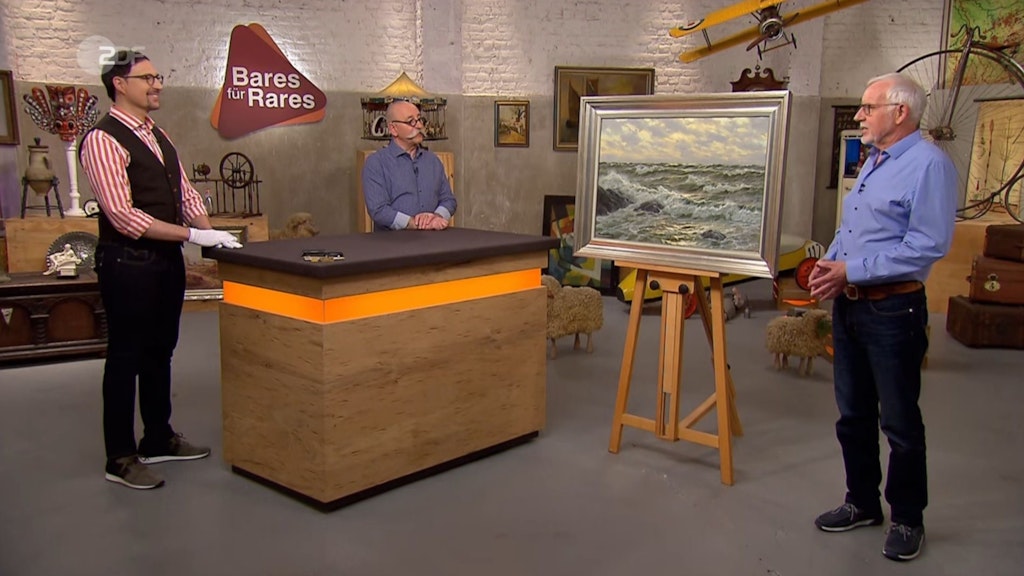 „Bares für Rares“-Experte Colmar Schulte-Goltz und Moderator Horst Lichter schwärmen von der rauen See auf dem Bild.