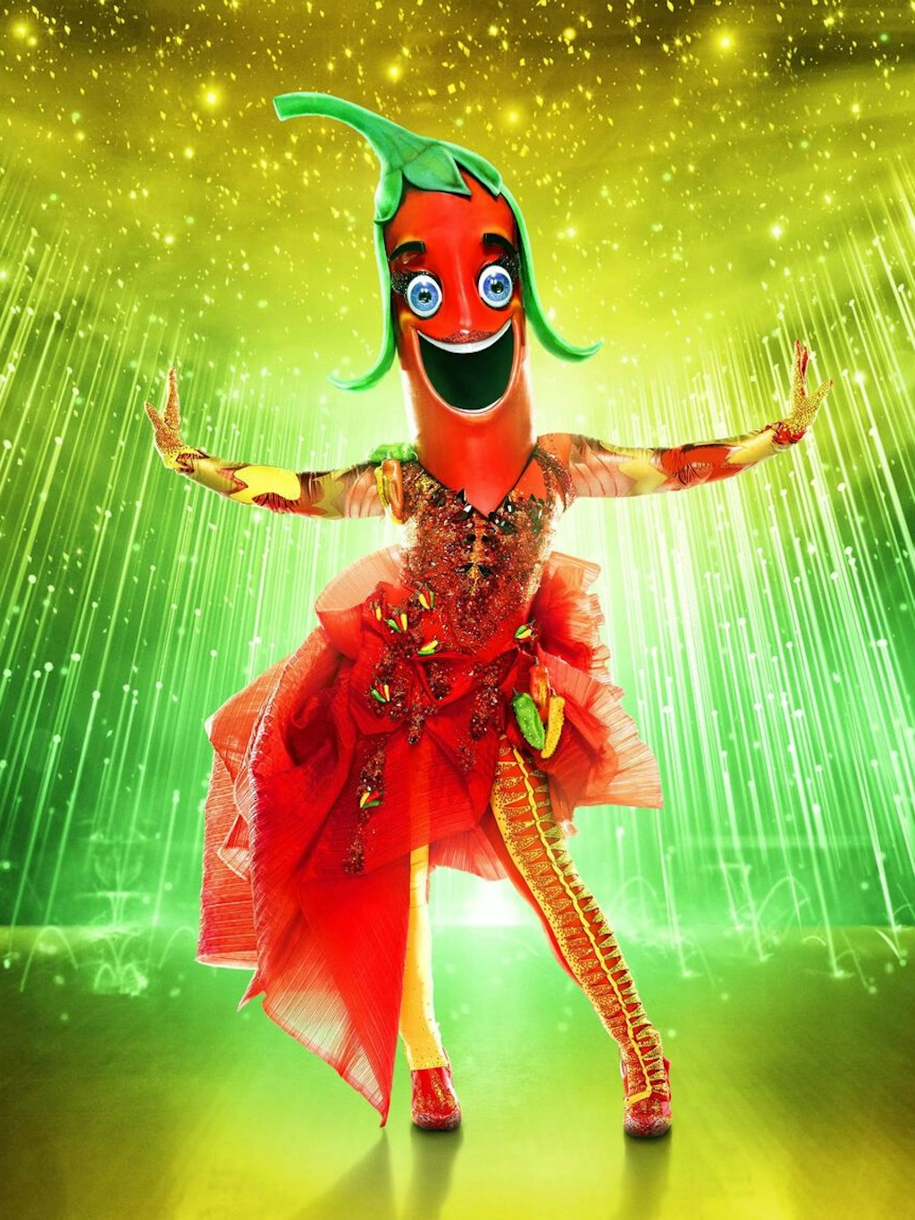 Auch in den USA geht es scharf her! Das ist Pepper, die Chili-Schote - sie ist aktuell in der sechsten Staffel von „The Masked Singer“ in Amerika zu sehen.
