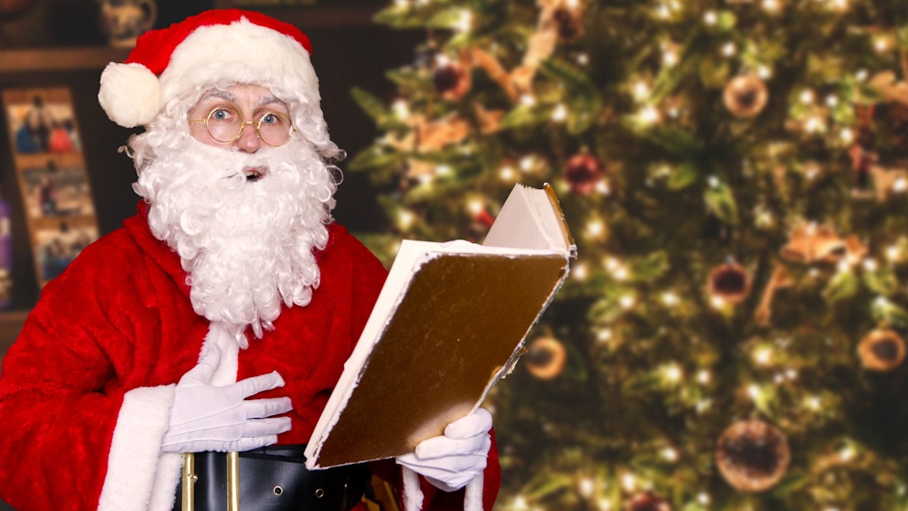 Ein Weihnachtsmann von Weihnachtsmann2go liest vor.