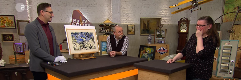 Experte Detlef Kümmel, Moderator Horst Lichter und Kandidatin Marlies bei „Bares für Rares“.