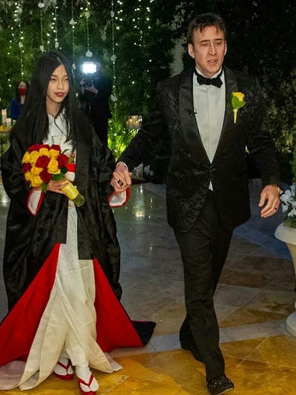 Braut Riko Shibata trug bei der Trauung in Las Vegas einen Hochzeits-Kimono, Bräutigam Niclas Cage einen Smoking von Designer Tom Ford.