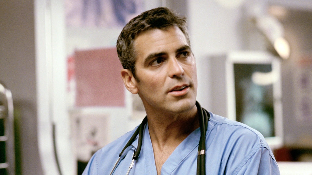 George Clooney als Herzensbrecher und Kinderarzt Doug Ross in der Krankenhausserie <a href="https://de.wikipedia.org/wiki/Emergency_Room_%E2%80%93_Die_Notaufnahme">„Emergency Room“</a>.