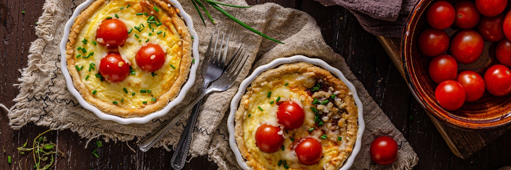 Delicious cake with eggs and bacon