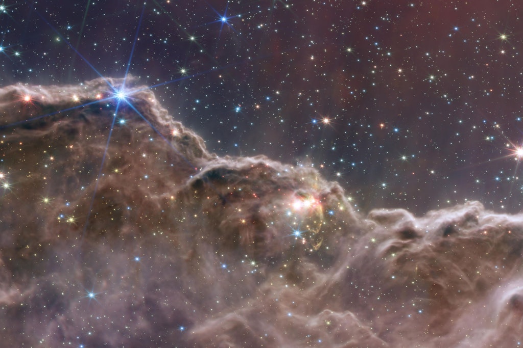 Dieses von der US-Weltraumbehörde NASA vorgestellte Bild zeigt die Entstehung einer Sternen-Region im Carina-Nebel, 7600 Lichtjahre von der Erde entfernt.