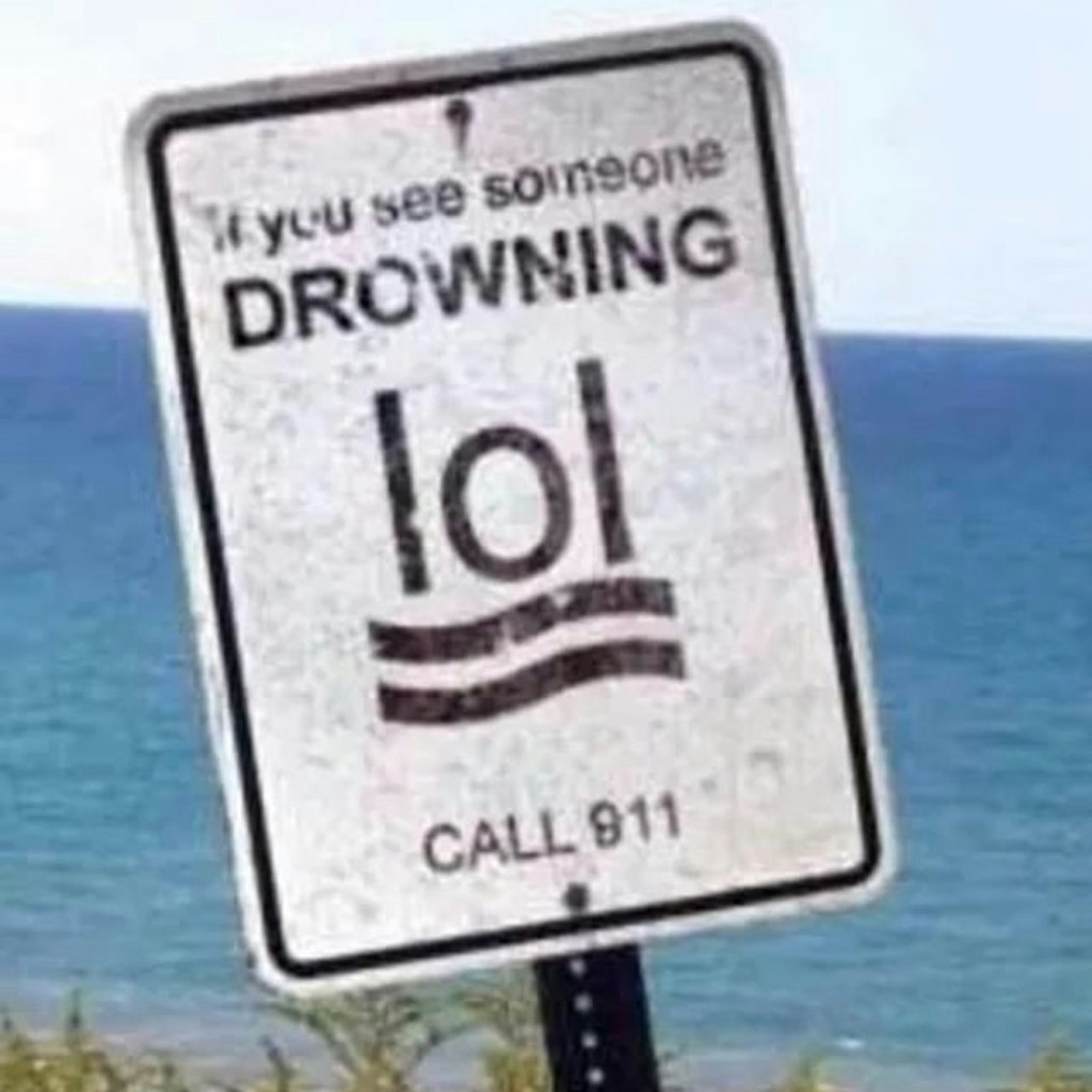 Eigentlich ist dieses Schild an einem Strand in Florida nicht zum Lachen, sondern todernst.
