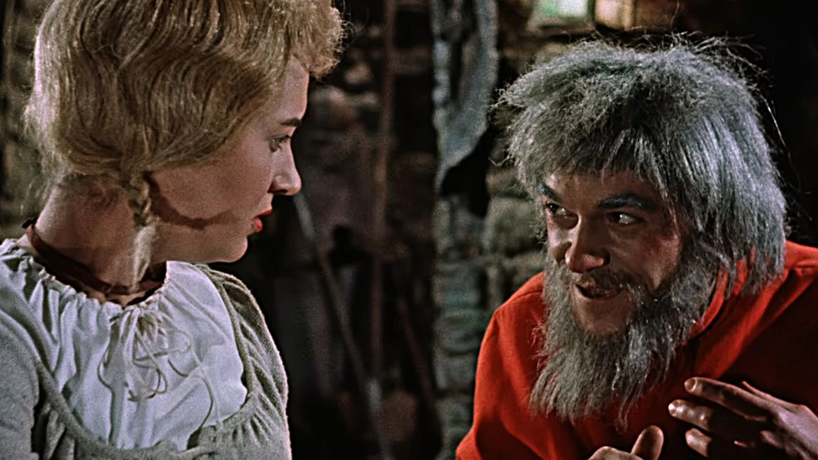 Die Müllerstochter Marie (Karin Lesch) mit dem Rumpelstilzchen (Siegfried Seibt) in „Das Zaubermännchen“.