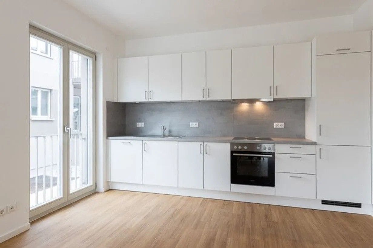 Quartier Marienufer: So sieht die offene Küche im Expose zu einer 4-Zimmer-Wohnung aus.