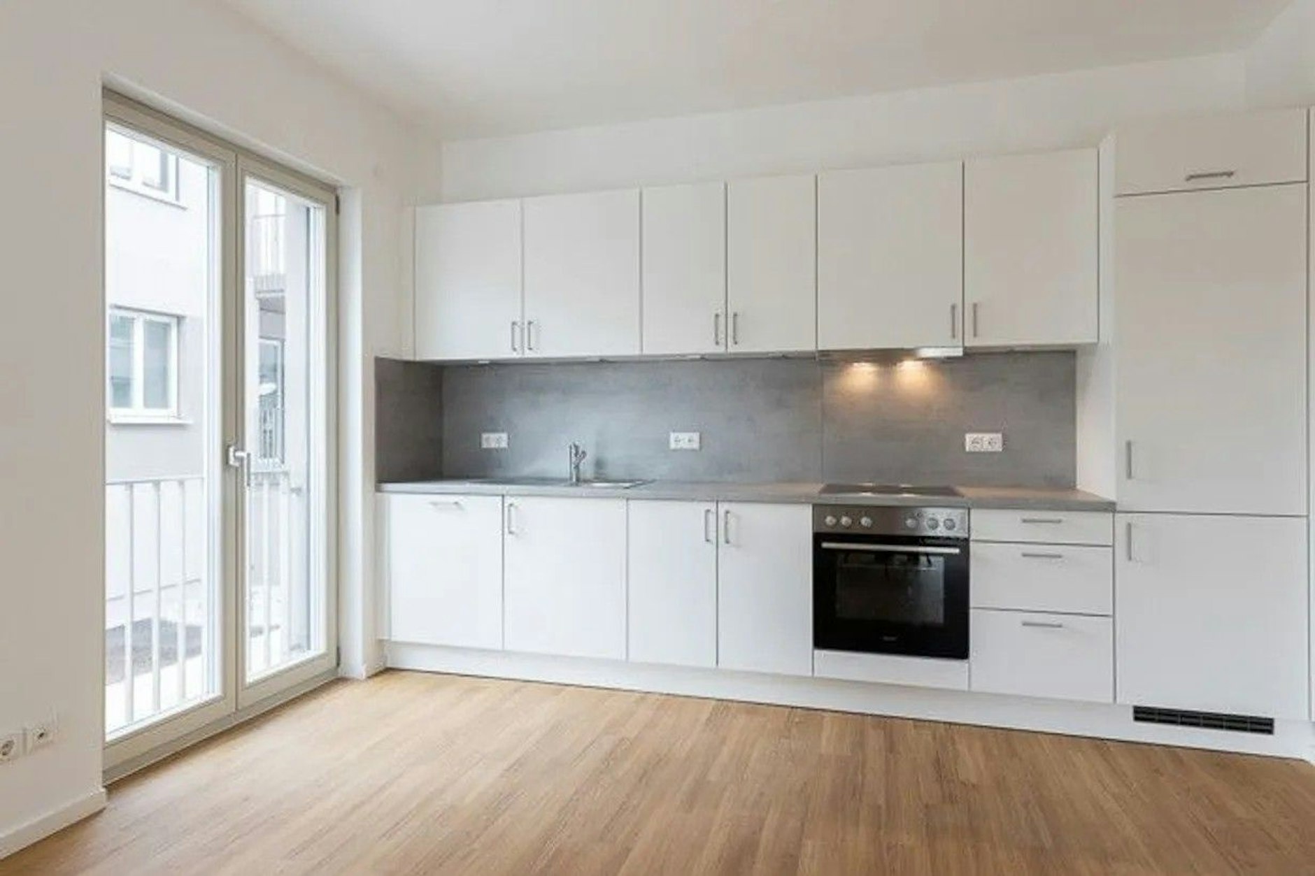 Quartier Marienufer: So sieht die offene Küche im Expose zu einer 4-Zimmer-Wohnung aus.
